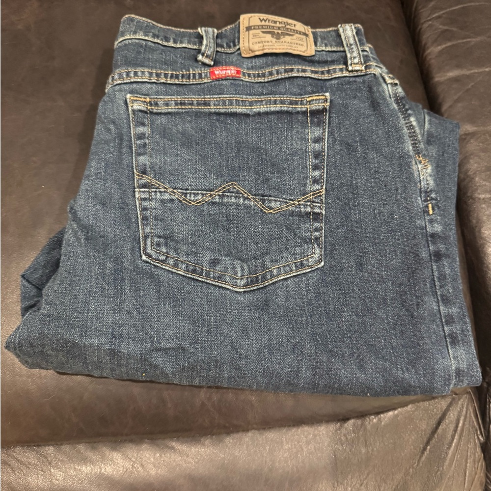 Wrangler Relaxed Fit Dark Indigo Jeans with Natural Fading